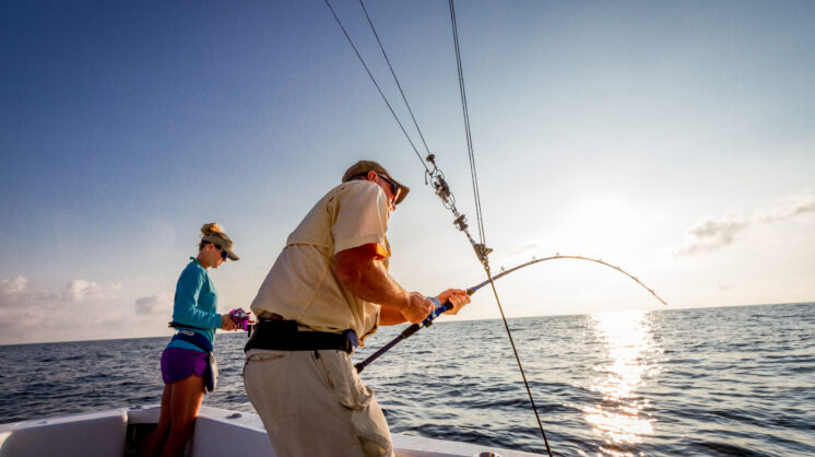 Fishermen casting lines in the Corpus Christi bay